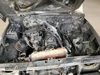 1986 Suzuki Samurai z VIN JS3JC51V1G4101572, wystawiony jako Copart lot #82712734 z przebiegiem Nie podano mil oraz Szkody całkowita. Historia ofert i sprzedaży dostępna na DreamBid. Obrazek 11.