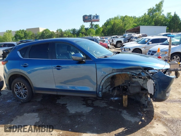 2020 Mazda CX-5 Touring z VIN JM3KFBCM2L0848233, wystawiony jako IAAI lot #42189719 z przebiegiem 80 893 mil mil oraz . Historia ofert i sprzedaży dostępna na DreamBid. Obrazek 14.