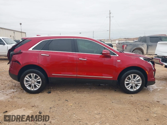 2023 Cadillac XT5 FWD Luxury z VIN 1GYKNAR42PZ147121, wystawiony jako IAAI lot #41315848 z przebiegiem 10 444 mil mil oraz . Historia ofert i sprzedaży dostępna na DreamBid. Obrazek 13.
