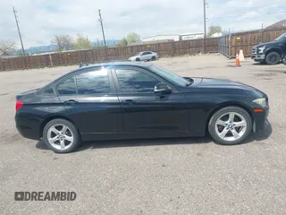 2014 BMW 3 Series 328i xDrive with VIN WBA3B3C56EJ981322, listed as a IAAI auction lot 42104530 with 104,376 mi miles. Bid and sale history available at carsss.com. Image 13.