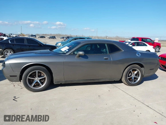 2012 Dodge Challenger SXT Plus with VIN 2C3CDYAG1CH262352, listed as a IAAI auction lot 41662002 with 141,868 mi miles. Bid and sale history available at carsss.com. Image 14.