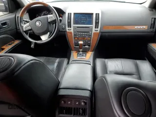 2008 Cadillac STS AWD z VIN 1G6DD67V780169103, wystawiony jako Copart lot #41398955 z przebiegiem 71 811 mil mil oraz Tytuł czysty. Historia ofert i sprzedaży dostępna na DreamBid. Obrazek 8.