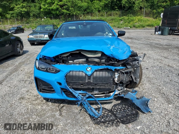 2023 BMW 4 Series 430i xDrive with VIN WBA43AT01PCM32225, listed as a Copart auction lot 60509935 with 25,769 mi miles and Salvage title. Bid and sale history available at DreamBid. Image 5.