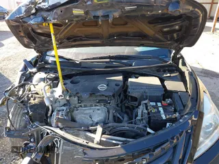 2015 Nissan Altima SV with VIN 1N4AL3AP7FC297435, listed as a IAAI auction lot 41334651 with 147,356 mi miles and . Bid and sale history available at DreamBid. Image 10.