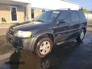 2001 Ford Escape XLT with VIN 1FMCU04141KB40767, listed as a Copart auction lot 71492664 with 118,541 mi miles and Salvage Title. Bid and sale history available at carsss.com. Image 1.