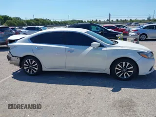 2016 Nissan Altima SV with VIN 1N4AL3AP9GC135114, listed as a IAAI auction lot 41851507 with 127,033 mi miles and . Bid and sale history available at DreamBid. Image 14.