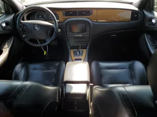 2005 Jaguar S-Type with VIN SAJWA03V251N28012, listed as a Copart auction lot 74417644 with 128,947 mi miles and Salvage Title. Bid and sale history available at DreamBid. Image 8.