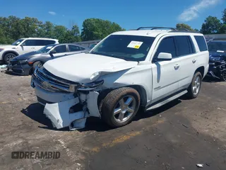 2015 Chevrolet Tahoe LT with VIN 1GNSCBKC4FR648715, listed as a IAAI auction lot 42267719 with Not provided miles and . Bid and sale history available at DreamBid. Image 17.