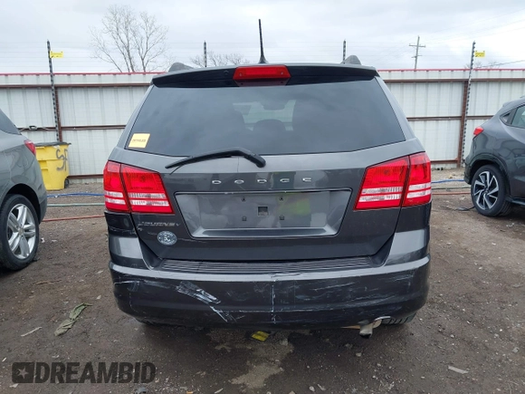 2017 Dodge Journey SE with VIN 3C4PDCAB9HT603595, listed as a IAAI auction lot 41914690 with 104,960 mi miles and . Bid and sale history available at DreamBid. Image 16.