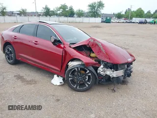 2022 Kia K5 GT-Line z VIN 5XXG64J29NG121197, wystawiony jako IAAI lot #39659829 z przebiegiem 49 590 mil mil oraz . Historia ofert i sprzedaży dostępna na DreamBid. Obrazek 1.