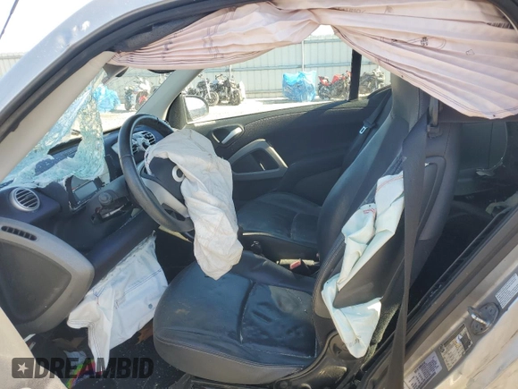 2012 Smart fortwo Pure z VIN WMEEJ3BA4CK541976, wystawiony jako Copart lot #88911095 z przebiegiem Nie podano mil oraz Nie do naprawy • Non repairable. Historia ofert i sprzedaży dostępna na DreamBid. Obrazek 7.