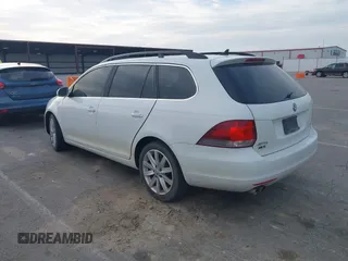 2014 Volkswagen Jetta TDI w/Sunroof & Nav with VIN 3VWPL7AJ7EM617385, listed as a IAAI auction lot 42012881 with 98,015 mi miles and . Bid and sale history available at DreamBid. Image 3.