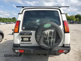 2004 Land Rover Discovery SE z VIN SALTY19414A846664, wystawiony jako Copart lot #59127655 z przebiegiem 182 800 mil mil oraz Czysty tytuł • Clean title. Historia ofert i sprzedaży dostępna na DreamBid. Obrazek 6.