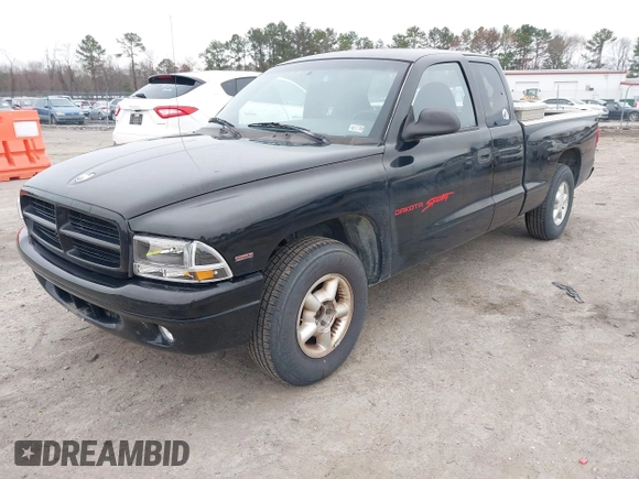 1999 Dodge Dakota with VIN 1B7FL22P8XS232450, listed as a IAAI auction lot 41754680 with 122,594 mi miles. Bid and sale history available at carsss.com. Image 2.