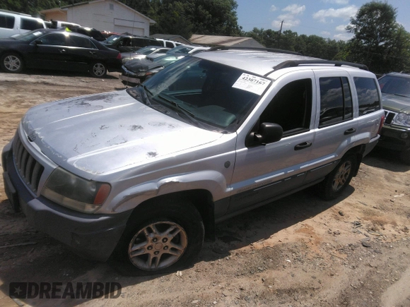 2004 Jeep Grand Cherokee Laredo z VIN 1J4GW48SX4C309998, wystawiony jako IAAI lot #42307167 z przebiegiem 306 912 mil mil oraz . Historia ofert i sprzedaży dostępna na DreamBid. Obrazek 17.