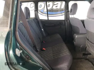 2000 Toyota RAV4 z VIN JT3GP10V6Y7072582, wystawiony jako Copart lot #60486825 z przebiegiem 182 699 mil mil oraz Szkoda całkowita • Salvage title. Historia ofert i sprzedaży dostępna na DreamBid. Obrazek 10.