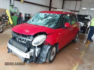 2015 FIAT 500L Easy with VIN ZFBCFABH4FZ031733, listed as a IAAI auction lot 40058070 with 79,801 mi miles and . Bid and sale history available at DreamBid. Image 2.