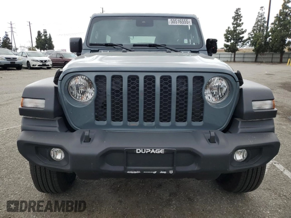 2024 Jeep Wrangler Sport S with VIN 1C4PJXDN4RW124924, listed as a Copart auction lot 50516555 with 7,747 mi miles and Salvage Title. Bid and sale history available at DreamBid. Image 5.