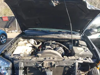2006 GMC Envoy Denali with VIN 1GKET63M962355586, listed as a IAAI auction lot 41881023 with 235,506 mi miles. Bid and sale history available at carsss.com. Image 10.