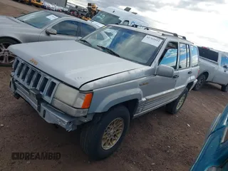 1995 Jeep Grand Cherokee Limited with VIN 1J4GZ78Y3SC649231, listed as a IAAI auction lot 41763953 with 140,889 mi miles. Bid and sale history available at carsss.com. Image 2.