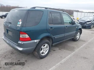 1999 Mercedes-Benz M 320/430/500 with VIN 4JGAB54E8XA055359, listed as a IAAI auction lot 41808170 with 161,573 mi miles and . Bid and sale history available at DreamBid. Image 4.