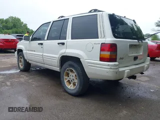 1997 Jeep Grand Cherokee Limited z VIN 1J4GZ78S1VC536295, wystawiony jako IAAI lot #42435292 z przebiegiem 310 005 mil mil oraz . Historia ofert i sprzedaży dostępna na DreamBid. Obrazek 3.