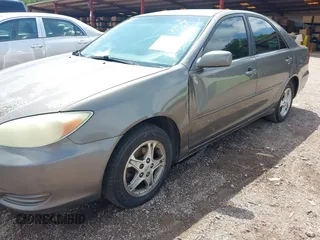 2004 Toyota Camry LE with VIN 4T1BE30K24U921028, listed as a IAAI auction lot 42187174 with 295,174 mi miles and . Bid and sale history available at DreamBid. Image 12.