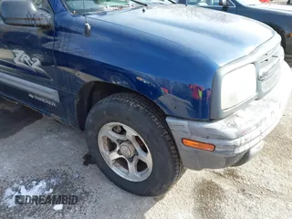 2004 Chevrolet Tracker ZR2 z VIN 2CNBJ734746917149, wystawiony jako IAAI lot #41649562 z przebiegiem 216 092 mil mil oraz . Historia ofert i sprzedaży dostępna na DreamBid. Obrazek 6.