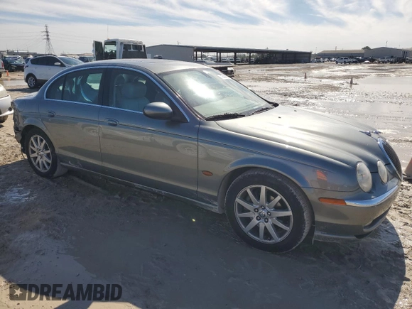 2003 Jaguar S-Type with VIN SAJEB01T83FM51480, listed as a Copart auction lot 43444065 with 83,840 mi miles and Salvage Title. Bid and sale history available at DreamBid. Image 4.