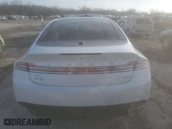 2015 Lincoln MKZ Hybrid z VIN 3LN6L2LU5FR610833, wystawiony jako Copart lot #43789095 z przebiegiem Nie podano mil oraz Szkoda całkowita • Salvage title. Historia ofert i sprzedaży dostępna na DreamBid. Obrazek 6.