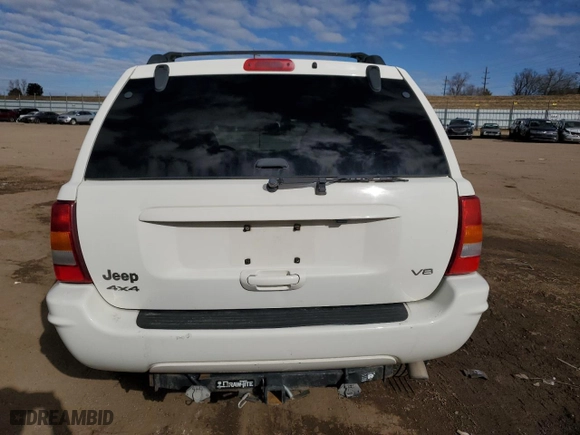2004 Jeep Grand Cherokee Limited with VIN 1J4GW58N74C142578, listed as a Copart auction lot 43137315 with 93,934 mi miles and Salvage Title. Bid and sale history available at carsss.com. Image 6.