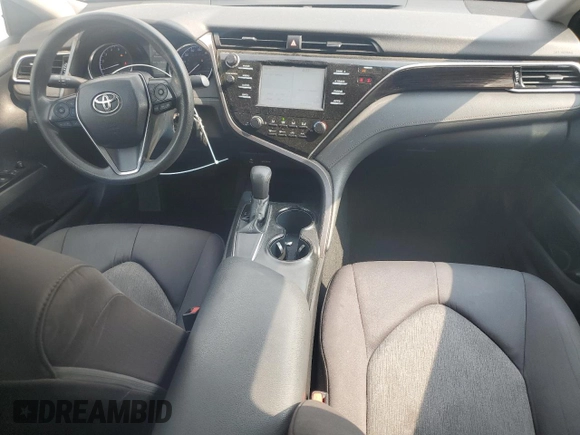 2018 Toyota Camry LE с VIN 4T1B11HK1JU118582, выставлен на аукционе Copart как лот 57972895 с пробегом 39 776 миль миль и Списание • Salvage title. История ставок и продаж доступна на DreamBid. Изображение 8.