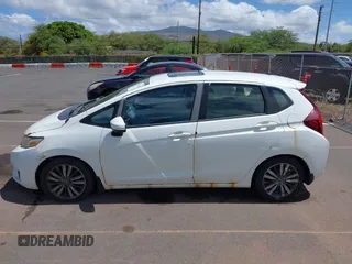 2016 Honda Fit EX with VIN JHMGK5H7XGX013345, listed as a IAAI auction lot 42679970 with 84,582 mi miles and . Bid and sale history available at DreamBid. Image 14.