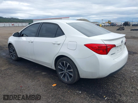 2019 Toyota Corolla L with VIN 5YFBURHE1KP937059, listed as a IAAI auction lot 41901278 with 98,796 mi miles and . Bid and sale history available at DreamBid. Image 3.