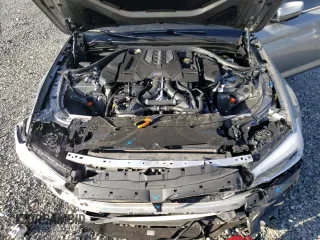 2018 BMW M5 z VIN WBSJF0C56JB282086, wystawiony jako Copart lot #37483454 z przebiegiem Nie podano mil oraz Szkoda całkowita • Salvage title. Historia ofert i sprzedaży dostępna na DreamBid. Obrazek 12.