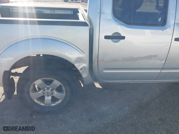 2011 Nissan Frontier PRO-4X with VIN 1N6AD0EV3BC434991, listed as a IAAI auction lot 42086934 with 189,908 mi miles. Bid and sale history available at carsss.com. Image 6.