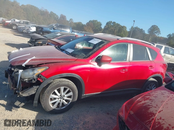 2015 Mazda CX-5 Touring with VIN JM3KE4CY6F0455468, listed as a IAAI auction lot 40669780 with 225,831 mi miles and . Bid and sale history available at carsss.com. Image 15.