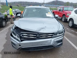 2019 Volkswagen Tiguan S with VIN 3VV1B7AX9KM110873, listed as a IAAI auction lot 42010931 with 82,745 mi miles and . Bid and sale history available at DreamBid. Image 12.