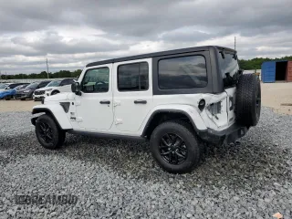 2023 Jeep Wrangler Sport S with VIN 1C4HJXDNXPW569699, listed as a Copart auction lot 52392145 with 32,972 mi miles and Salvage title. Bid and sale history available at DreamBid. Image 2.