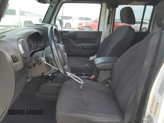 2015 Jeep Wrangler Unlimited Sport with VIN 1C4BJWDG2FL545561, listed as a Copart auction lot 60574045 with 83,592 mi miles and Salvage title. Bid and sale history available at DreamBid. Image 7.