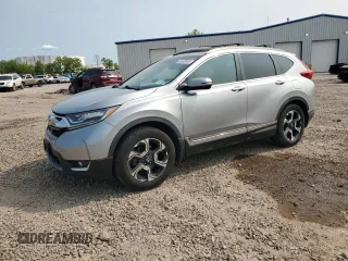 2018 Honda CR-V Touring with VIN 7FARW1H90JE034235, listed as a Copart auction lot 58993955 with 107,570 mi miles and Salvage title. Bid and sale history available at DreamBid. Image 1.