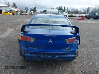 2015 Mitsubishi Lancer Evolution GSR with VIN JA32W8FV4FU012578, listed as a IAAI auction lot 41730742 with 64,762 mi miles. Bid and sale history available at carsss.com. Image 17.