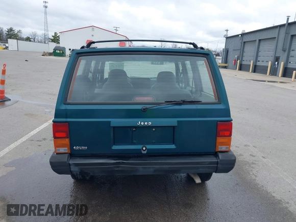 1996 Jeep Cherokee Sport with VIN 1J4FJ68S5TL235507, listed as a IAAI auction lot 41834736 with 174,634 mi miles. Bid and sale history available at carsss.com. Image 16.
