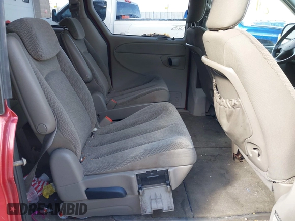 2005 Dodge Grand Caravan with VIN 2D4G944L75R310409, listed as a IAAI auction lot 41781132 with 128,120 mi miles and . Bid and sale history available at DreamBid. Image 8.