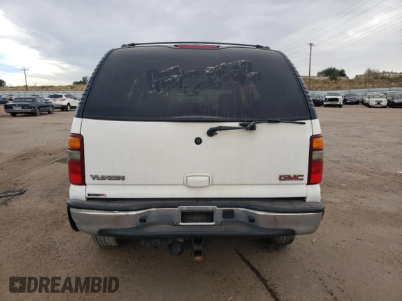 2003 GMC Yukon SLE with VIN 1GKEK13T43R205384, listed as a Copart auction lot 76916664 with 258,551 mi miles and Salvage Title. Bid and sale history available at carsss.com. Image 6.