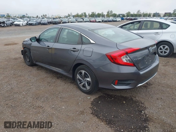 2020 Honda Civic LX with VIN 2HGFC2F63LH567698, listed as a IAAI auction lot 42354886 with 70,977 mi miles and . Bid and sale history available at DreamBid. Image 3.