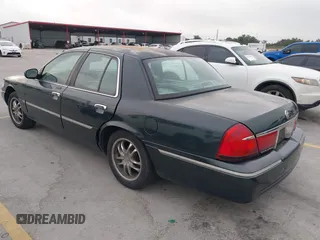 2002 Mercury Grand Marquis LS Premium z VIN 2MEFM75WX2X626520, wystawiony jako IAAI lot #42374203 z przebiegiem 139 692 mil mil oraz . Historia ofert i sprzedaży dostępna na DreamBid. Obrazek 3.