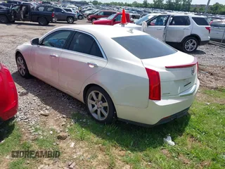 2013 Cadillac ATS with VIN 1G6AA5RA1D0139105, listed as a IAAI auction lot 42264614 with 69,049 mi miles and . Bid and sale history available at DreamBid. Image 3.
