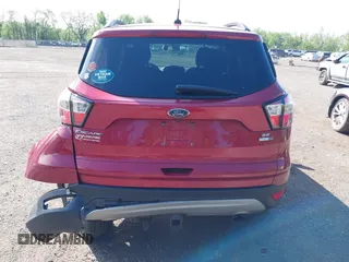 2018 Ford Escape SE z VIN 1FMCU9GD8JUB33366, wystawiony jako IAAI lot #42264706 z przebiegiem 48 478 mil mil oraz . Historia ofert i sprzedaży dostępna na DreamBid. Obrazek 17.