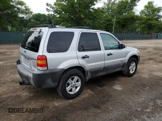 2005 Ford Escape Hybrid with VIN 1FMCU96H55KC74059, listed as a Copart auction lot 57065685 with 154,807 mi miles and Salvage title. Bid and sale history available at DreamBid. Image 3.